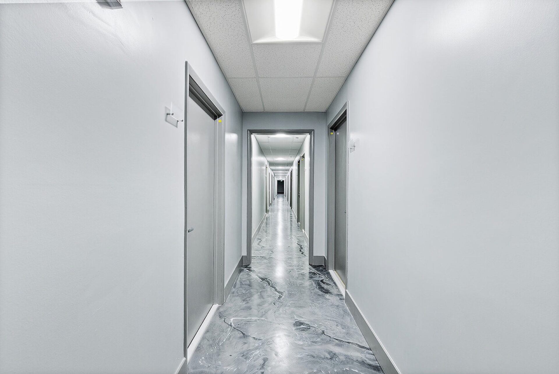 Modern interior hallway with LED lighting at Pompano Executive Rentals