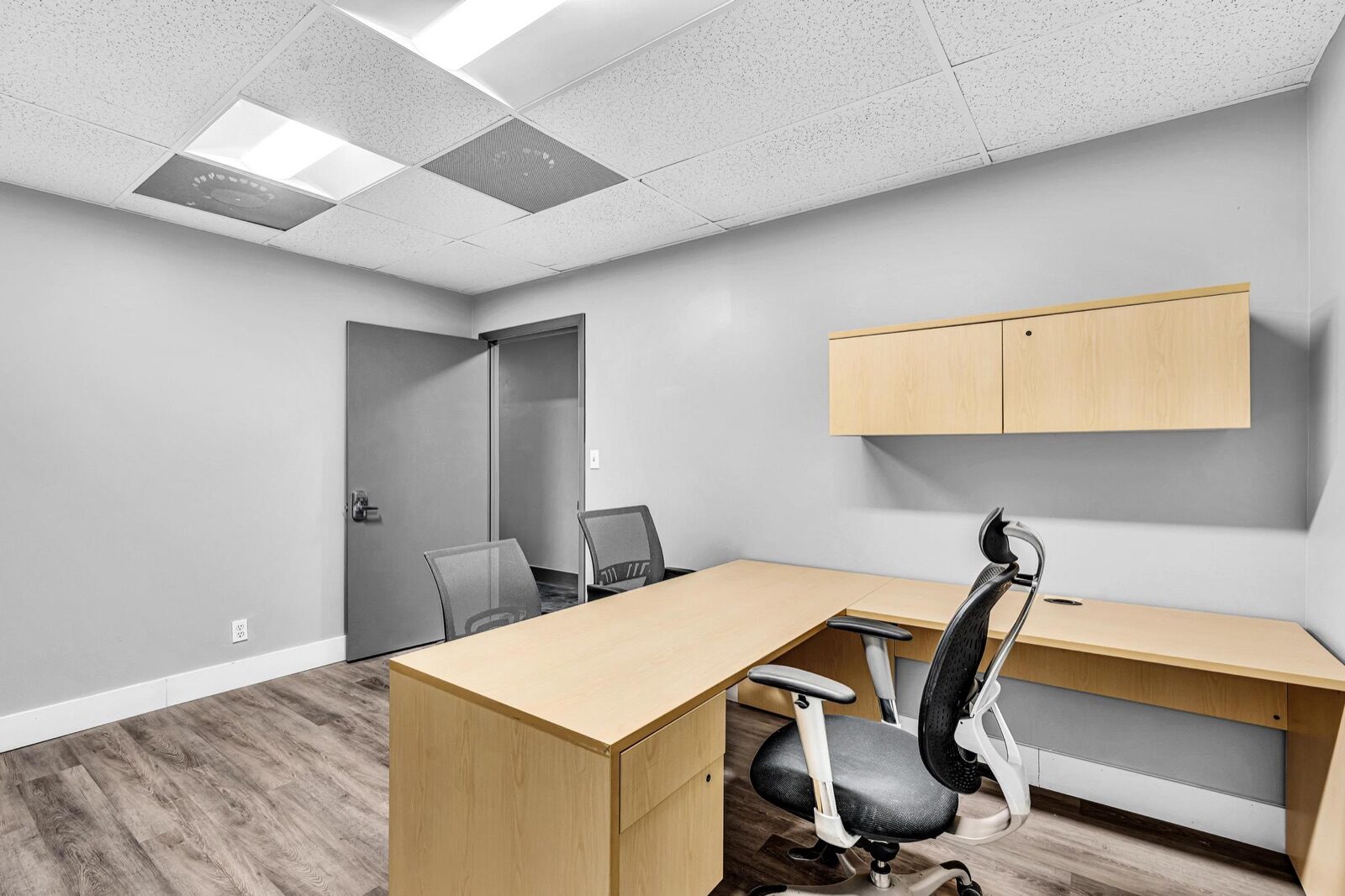 Executive office with desk and chairs at Pompano Executive Rentals